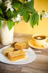 Honeycomb with a cup of tea and bouquet 이미지 (185505558) - 게티이미지뱅크 Honeycomb with a cup of tea and bouquet