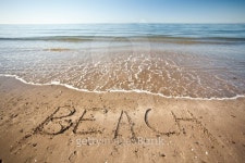word beach written at the sand 이미지 (178439107) - 게티이미지뱅크 word beach written at the sand