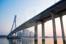 Flyovers across river in sunset 이미지 (462866621) - 게티이미지뱅크 Flyovers across river in sunset