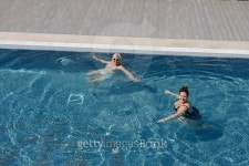 Women are doing spa exercises in water of swimming pool. 이미지 (527761145) - 게티이미지뱅크 Women are doing spa exercises in... 