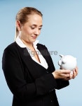 Beautiful businesswoman with piggybank believes in saving 이미지 (516912369) - 게티이미지뱅크 Beautiful businesswoman with... 