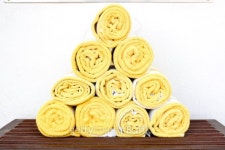 set of yellow towel on wood table 이미지 (508375539) - 게티이미지뱅크 set of yellow towel on wood table
