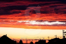 sunset lights up the clouds above an urban street 이미지 (516041787) - 게티이미지뱅크 sunset lights up the clouds above an... 