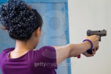 Target practicing with gun In the shooting range 이미지 (488206917) - 게티이미지뱅크 Target practicing with gun In the... 