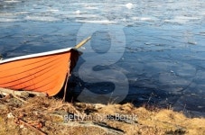orange rescue boat on the shore of a frozen lake 이미지 (494434083) - 게티이미지뱅크 orange rescue boat on the shore of a... 