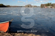 orange rescue boat on the shore of a frozen lake 이미지 (494434137) - 게티이미지뱅크 orange rescue boat on the shore of a... 