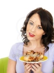 Young Woman Holding A Plate Cold Cooked Chicken Legs 이미지... Young Woman Holding A Plate Cold Cooked Chicken Legs