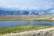 Landscape with a little lake on highland valley and mountains 이미지 (486224948) - 게티이미지뱅크 Landscape with a little... 