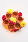 Colorful clay diya lamps lit during diwali celebration 이미지 (491874134) - 게티이미지뱅크 Colorful clay diya lamps lit... 
