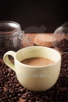 Coffee cup and coffee beans on wood background 이미지 (487246848) - 게티이미지뱅크 Coffee cup and coffee beans on wood background