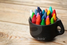 Oil pastel crayons in a mug on a wooden table 이미지 (466120146) - 게티이미지뱅크 Oil pastel crayons in a mug on a wooden table