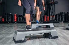 Couple legs over steppers training in aerobic class 이미지... 게티이미지뱅크 Couple legs over steppers training in aerobic class