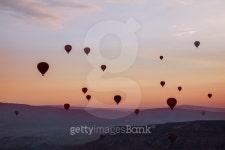 Hot air balloons flying up in the sky in silhouettes 이미지 (480824826) - 게티이미지뱅크 Hot air balloons flying up in the... 