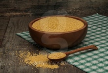 organic millet seeds in a bowl on wooden table 이미지 (484749442) - 게티이미지뱅크 organic millet seeds in a bowl on wooden table