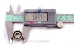 Bearing and electronic caliper on a white background 이미지 (470022750) - 게티이미지뱅크 Bearing and electronic caliper on a... 