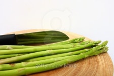 Asparagus on cutting board 이미지 (481716196) - 게티이미지뱅크 Asparagus on cutting board