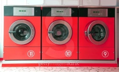 three red washing machines in coin laundry 이미지 (478291830) - 게티이미지뱅크 three red washing machines in coin laundry