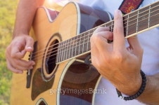 Mans hands playing acoustic guitar outdoors 이미지 (486474648) - 게티이미지뱅크 Mans hands playing acoustic guitar outdoors