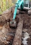 gas pipes and working excavator 이미지 (531759381) - 게티이미지뱅크 gas pipes and working excavator