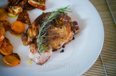Pork steak with roasted carrots and dried tomatoes 이미지 (477920716) - 게티이미지뱅크 Pork steak with roasted carrots and...