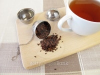 Honeybushtea and tea infuser ball 이미지 (465322766) - 게티이미지뱅크 Honeybushtea and tea infuser ball