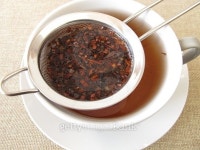 Honey bush tea in tea strainer 이미지 (466865148) - 게티이미지뱅크 Honey bush tea in tea strainer