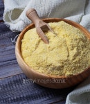 Corn grits in  wooden bowl 이미지 (483518588) - 게티이미지뱅크 Corn grits in  wooden bowl
