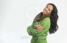 Profile smiling woman with green raincoat, brown scarf, crossed 이미지 (502323170) - 게티이미지뱅크 Profile smiling woman... 