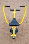 Black and yellow exercise equipment in playground 이미지 (497574256) - 게티이미지뱅크 Black and yellow exercise equipment in... 