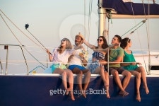 Merry company celebrates birthday on a yacht. 이미지 (493888614) - 게티이미지뱅크 Merry company celebrates birthday on a yacht.