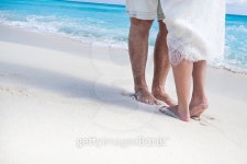 Close up male and female feet on the sand 이미지 (494902906) - 게티이미지뱅크 Close up male and female feet on the sand