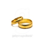 Gold rings on white background 이미지 (493608270) - 게티이미지뱅크 Gold rings on white background