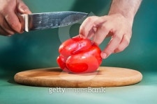 Unrecognizable man about to slice bell pepper. 이미지 (483422698) - 게티이미지뱅크 Unrecognizable man about to slice bell pepper.