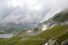 Mountain slopes in dark clouds 이미지 (481380926) - 게티이미지뱅크 Mountain slopes in dark clouds