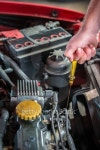 Car mechanic in auto repair service checking oil 이미지 (501847558) - 게티이미지뱅크 Car mechanic in auto repair service... 