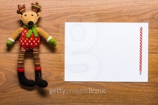 Letter to santa on a desk with cute reindeer toy 이미지 (501293108) - 게티이미지뱅크 Letter to santa on a desk with cute... 