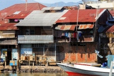 Straw poor houses by the river 이미지 (489316700) - 게티이미지뱅크 Straw poor houses by the river
