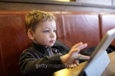 Child playing on a Tablet PC 이미지 (497899270) - 게티이미지뱅크 Child playing on a Tablet PC