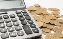 Calculator and gold coins. 이미지 (500517292) - 게티이미지뱅크 Calculator and gold coins.