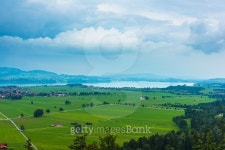 Green fields and a lake 이미지 (492807782) - 게티이미지뱅크 Green fields and a lake