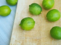 Limes on wooden cutting board 이미지 (482231434) - 게티이미지뱅크 Limes on wooden cutting board