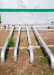 Oil pipelines from the pumping station belonging to the ground... Oil pipelines from the pumping station belonging to the ground