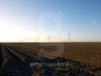 Freshly ploughed field with wind turbines at sunset 이미지 (484370520) - 게티이미지뱅크 Freshly ploughed field with wind... 