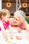 Grandmother and Granddaughter Playing Together 이미지 (484221884) - 게티이미지뱅크 Grandmother and Granddaughter Playing Together