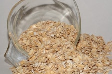 Raw oats and measuring cup 이미지 (501880138) - 게티이미지뱅크 Raw oats and measuring cup