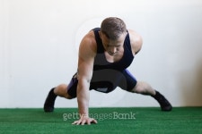 The athlete doing push-up in gym on a one hand 이미지 (513645308) - 게티이미지뱅크 The athlete doing push-up in gym on a one hand