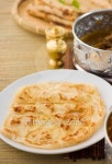 roti canai flat bread, very famous mamak food 이미지 (505400586) - 게티이미지뱅크 roti canai flat bread, very famous mamak food