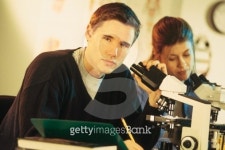 Young man in science class with microscope 이미지 (78490142) - 게티이미지뱅크 Young man in science class with microscope