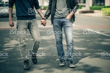 Gay Couple stock photo 530200821 | iStock Cropped image of gay couple holding hands