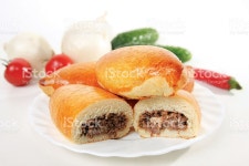 Meat Pies On A Plate stock photo 142531247 | iStock meat pies, whole and cut, against vegetables